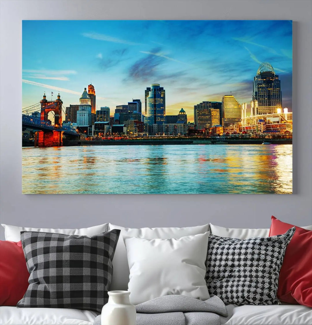 A triptych titled "Cincinnati City Lights Sunset Bright Blue Skyline Cityscape View Wall Art Canvas Print" is showcased, each canvas expertly crafted with museum-quality precision on a stretched wood frame.