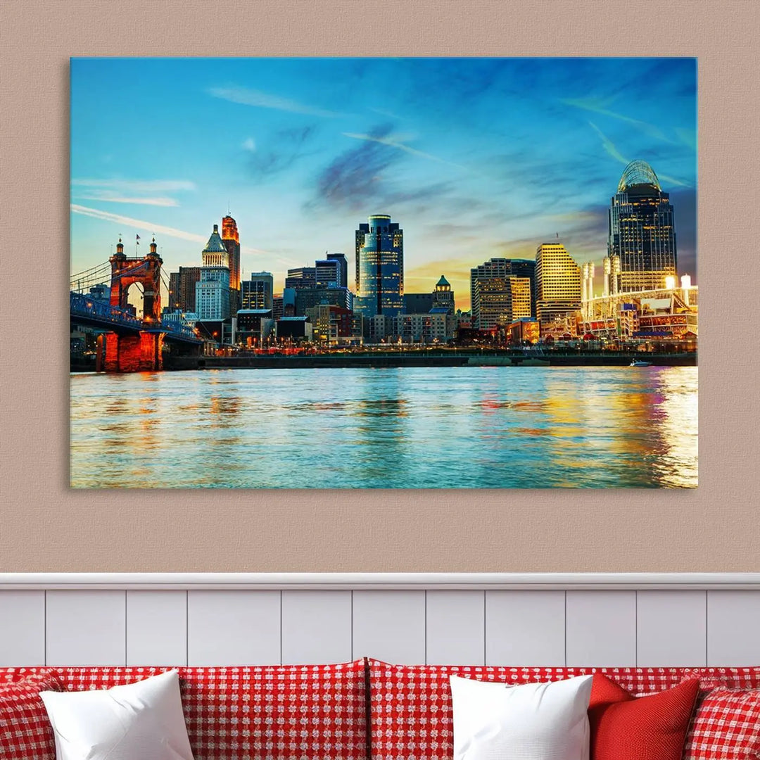 A triptych titled "Cincinnati City Lights Sunset Bright Blue Skyline Cityscape View Wall Art Canvas Print" is showcased, each canvas expertly crafted with museum-quality precision on a stretched wood frame.