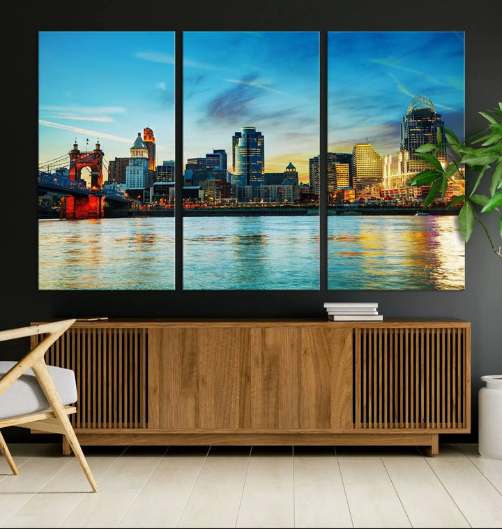 A triptych titled "Cincinnati City Lights Sunset Bright Blue Skyline Cityscape View Wall Art Canvas Print" is showcased, each canvas expertly crafted with museum-quality precision on a stretched wood frame.