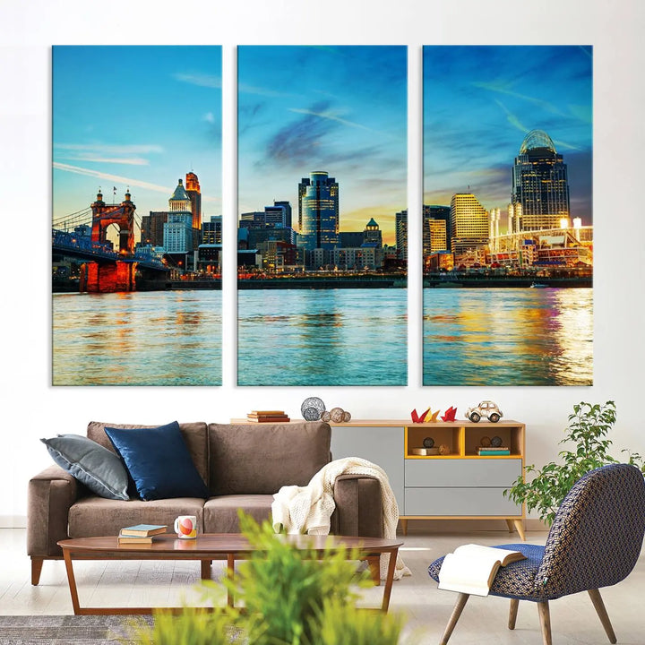 A triptych titled "Cincinnati City Lights Sunset Bright Blue Skyline Cityscape View Wall Art Canvas Print" is showcased, each canvas expertly crafted with museum-quality precision on a stretched wood frame.