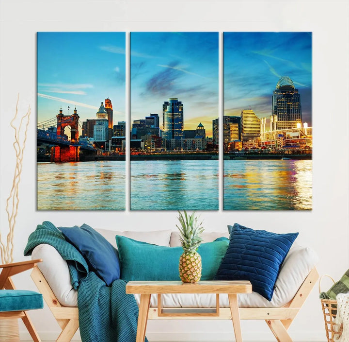 A triptych titled "Cincinnati City Lights Sunset Bright Blue Skyline Cityscape View Wall Art Canvas Print" is showcased, each canvas expertly crafted with museum-quality precision on a stretched wood frame.