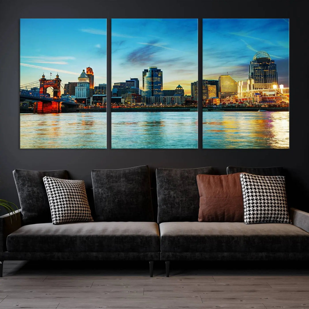 A triptych titled "Cincinnati City Lights Sunset Bright Blue Skyline Cityscape View Wall Art Canvas Print" is showcased, each canvas expertly crafted with museum-quality precision on a stretched wood frame.