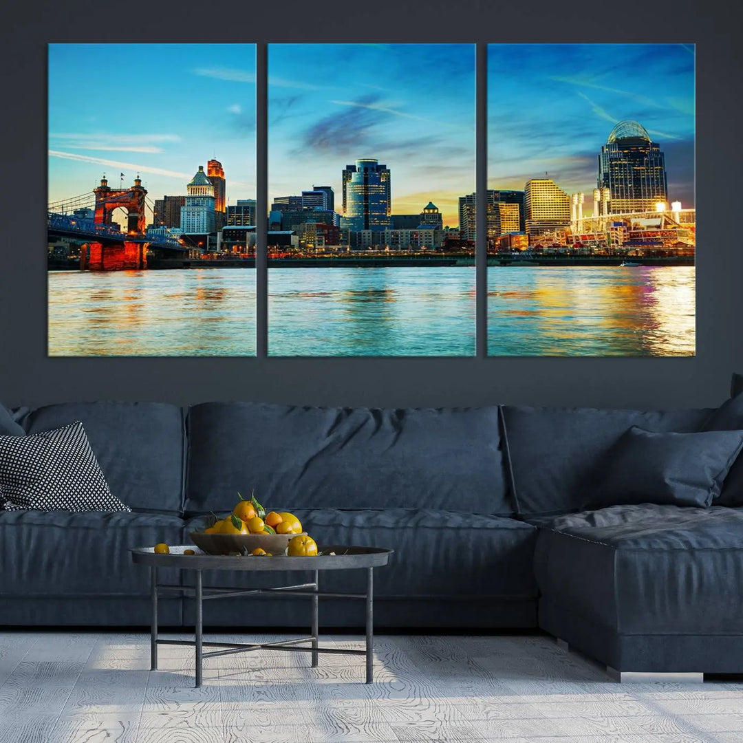 A triptych titled "Cincinnati City Lights Sunset Bright Blue Skyline Cityscape View Wall Art Canvas Print" is showcased, each canvas expertly crafted with museum-quality precision on a stretched wood frame.