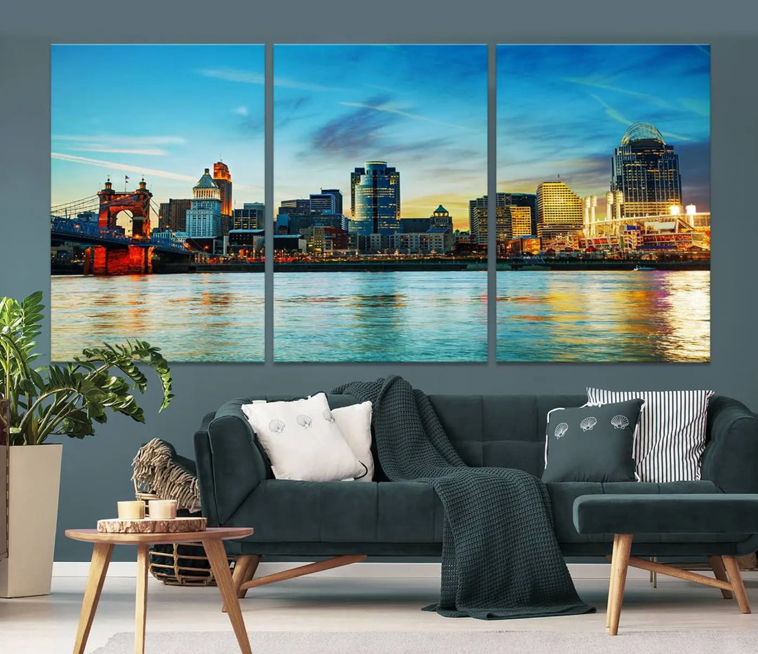 A triptych titled "Cincinnati City Lights Sunset Bright Blue Skyline Cityscape View Wall Art Canvas Print" is showcased, each canvas expertly crafted with museum-quality precision on a stretched wood frame.