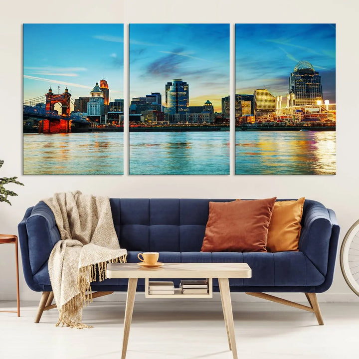 A triptych titled "Cincinnati City Lights Sunset Bright Blue Skyline Cityscape View Wall Art Canvas Print" is showcased, each canvas expertly crafted with museum-quality precision on a stretched wood frame.