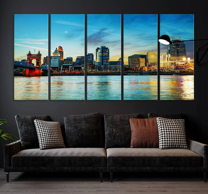 A triptych titled "Cincinnati City Lights Sunset Bright Blue Skyline Cityscape View Wall Art Canvas Print" is showcased, each canvas expertly crafted with museum-quality precision on a stretched wood frame.