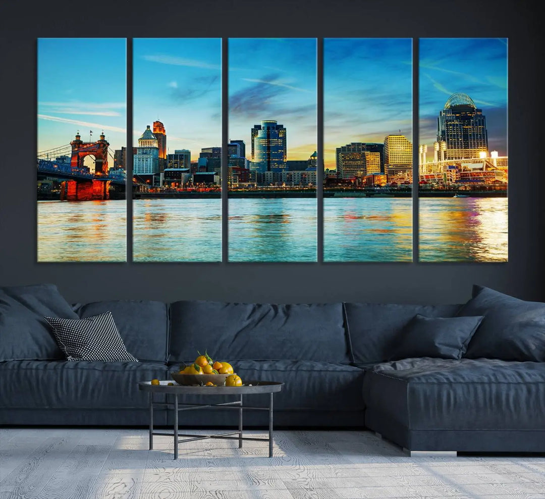 A triptych titled "Cincinnati City Lights Sunset Bright Blue Skyline Cityscape View Wall Art Canvas Print" is showcased, each canvas expertly crafted with museum-quality precision on a stretched wood frame.