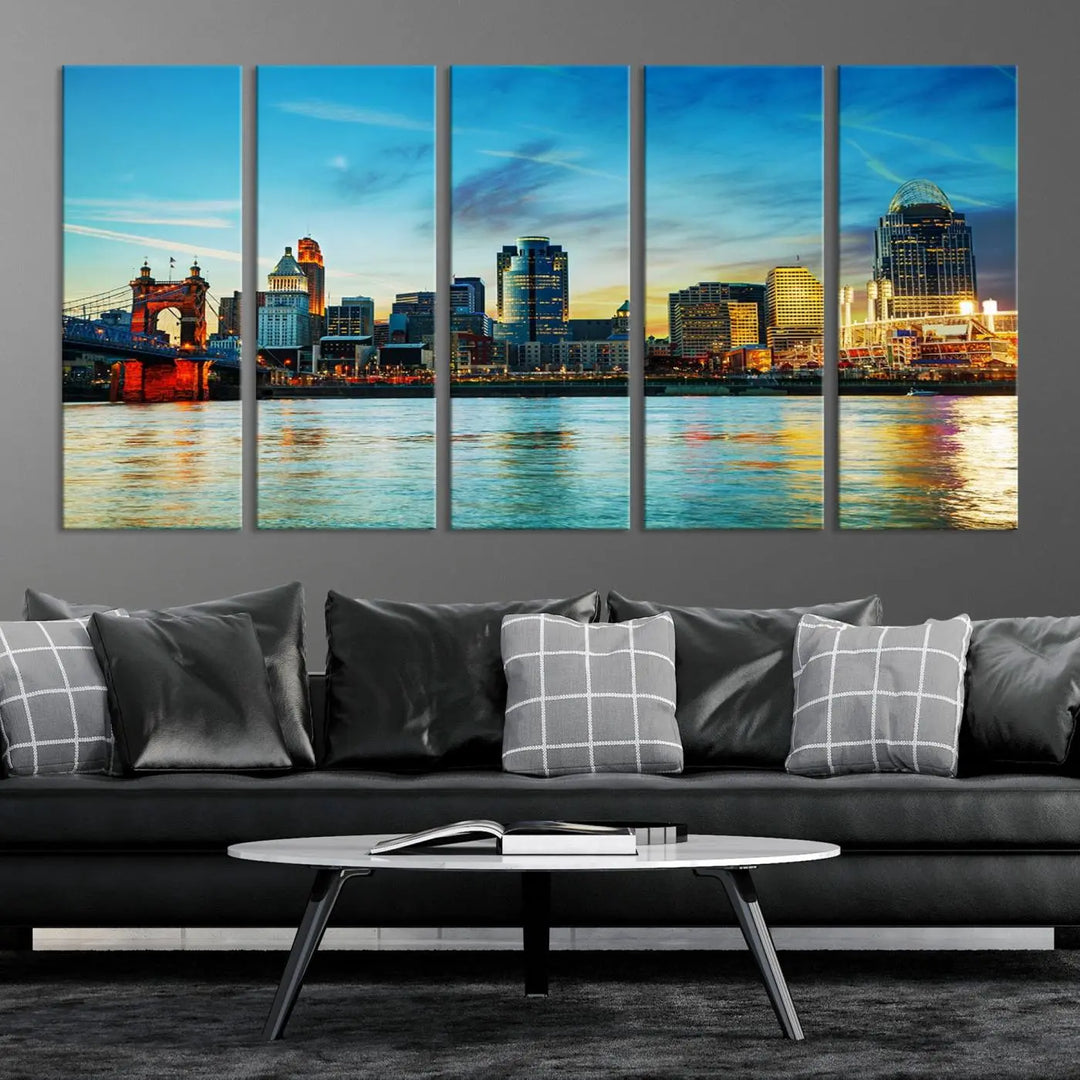 A triptych titled "Cincinnati City Lights Sunset Bright Blue Skyline Cityscape View Wall Art Canvas Print" is showcased, each canvas expertly crafted with museum-quality precision on a stretched wood frame.