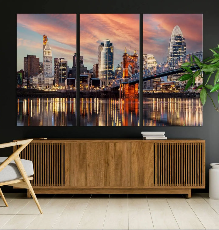 Experience the captivating Cincinnati City Lights Sunset Colorful Cloudy Skyline Cityscape View Wall Art Canvas Print. This gallery-wrapped, museum-quality canvas promises an elegant look and enduring beauty.