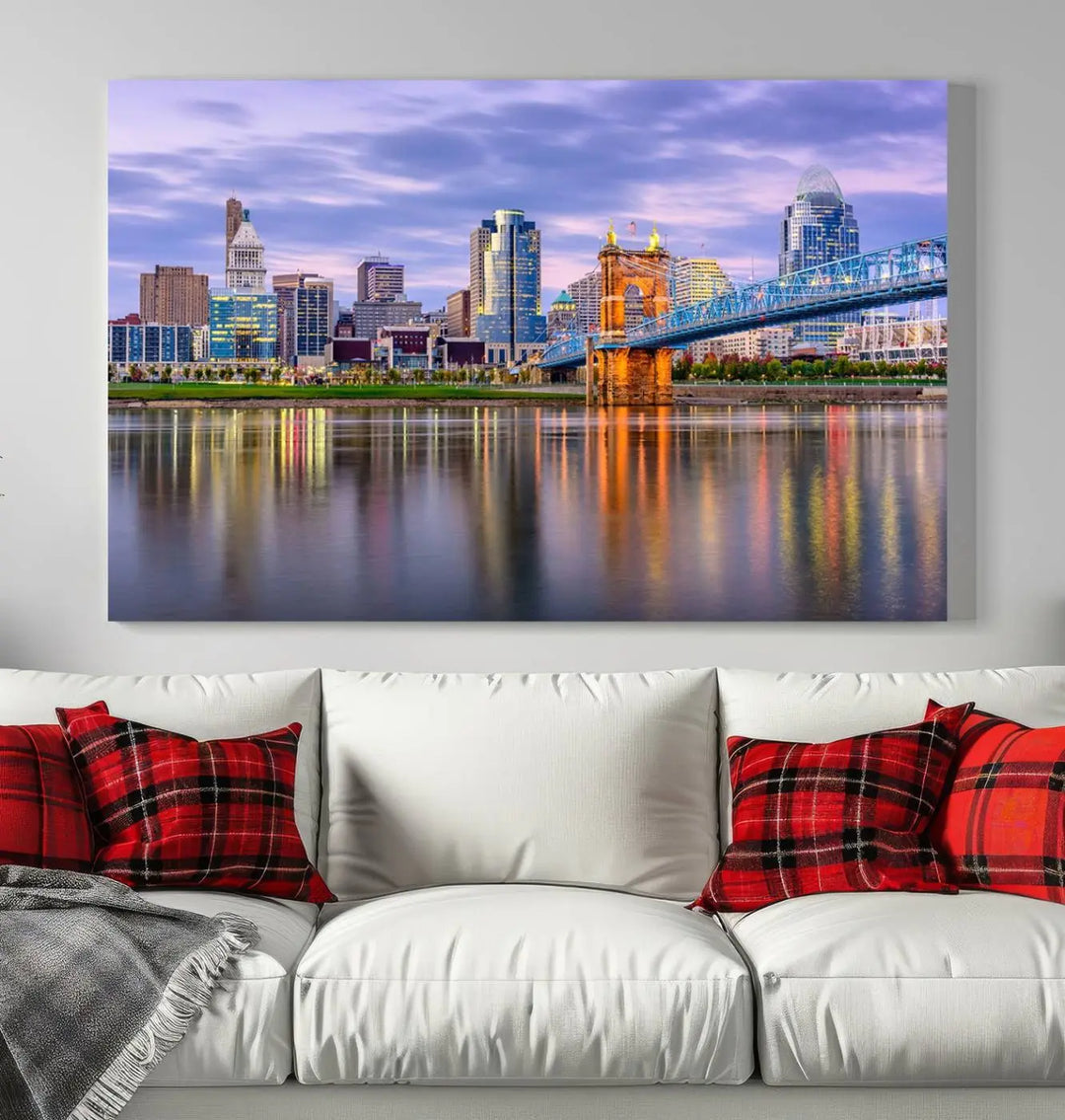 The room features the Cincinnati City Lights Sunset Purple Cloudy Skyline Cityscape View Wall Art Canvas Print, showcasing a breathtaking skyline reflecting on the river. Each piece is created with museum-quality canvas, includes UV-protective coating, and comes ready to hang.