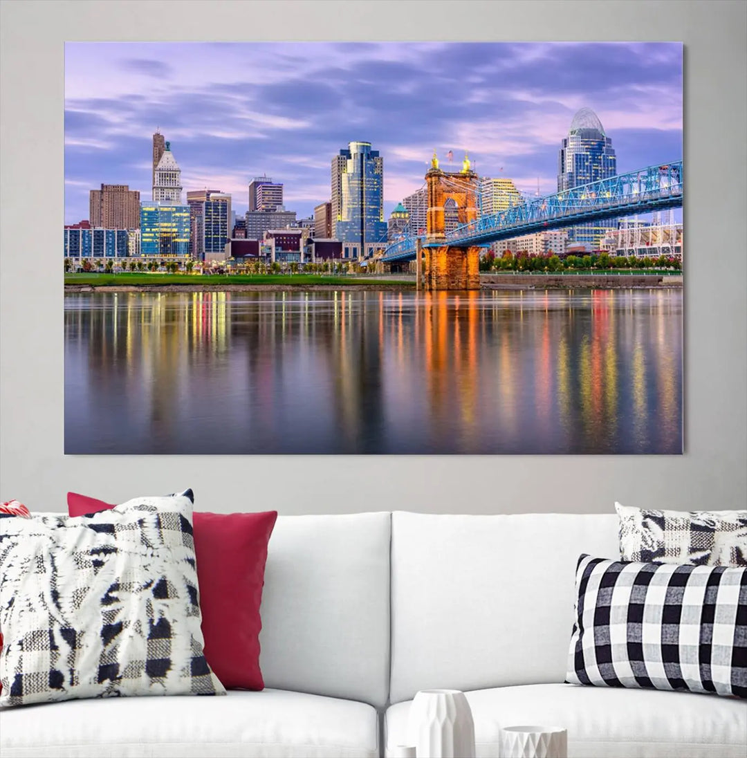 The room features the Cincinnati City Lights Sunset Purple Cloudy Skyline Cityscape View Wall Art Canvas Print, showcasing a breathtaking skyline reflecting on the river. Each piece is created with museum-quality canvas, includes UV-protective coating, and comes ready to hang.