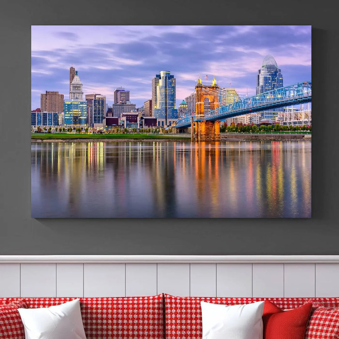 The room features the Cincinnati City Lights Sunset Purple Cloudy Skyline Cityscape View Wall Art Canvas Print, showcasing a breathtaking skyline reflecting on the river. Each piece is created with museum-quality canvas, includes UV-protective coating, and comes ready to hang.