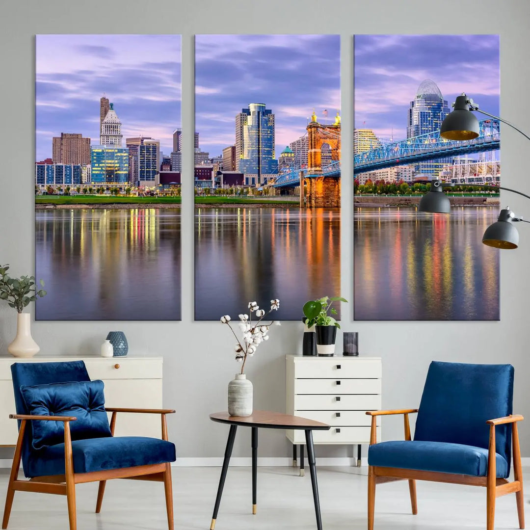 The room features the Cincinnati City Lights Sunset Purple Cloudy Skyline Cityscape View Wall Art Canvas Print, showcasing a breathtaking skyline reflecting on the river. Each piece is created with museum-quality canvas, includes UV-protective coating, and comes ready to hang.