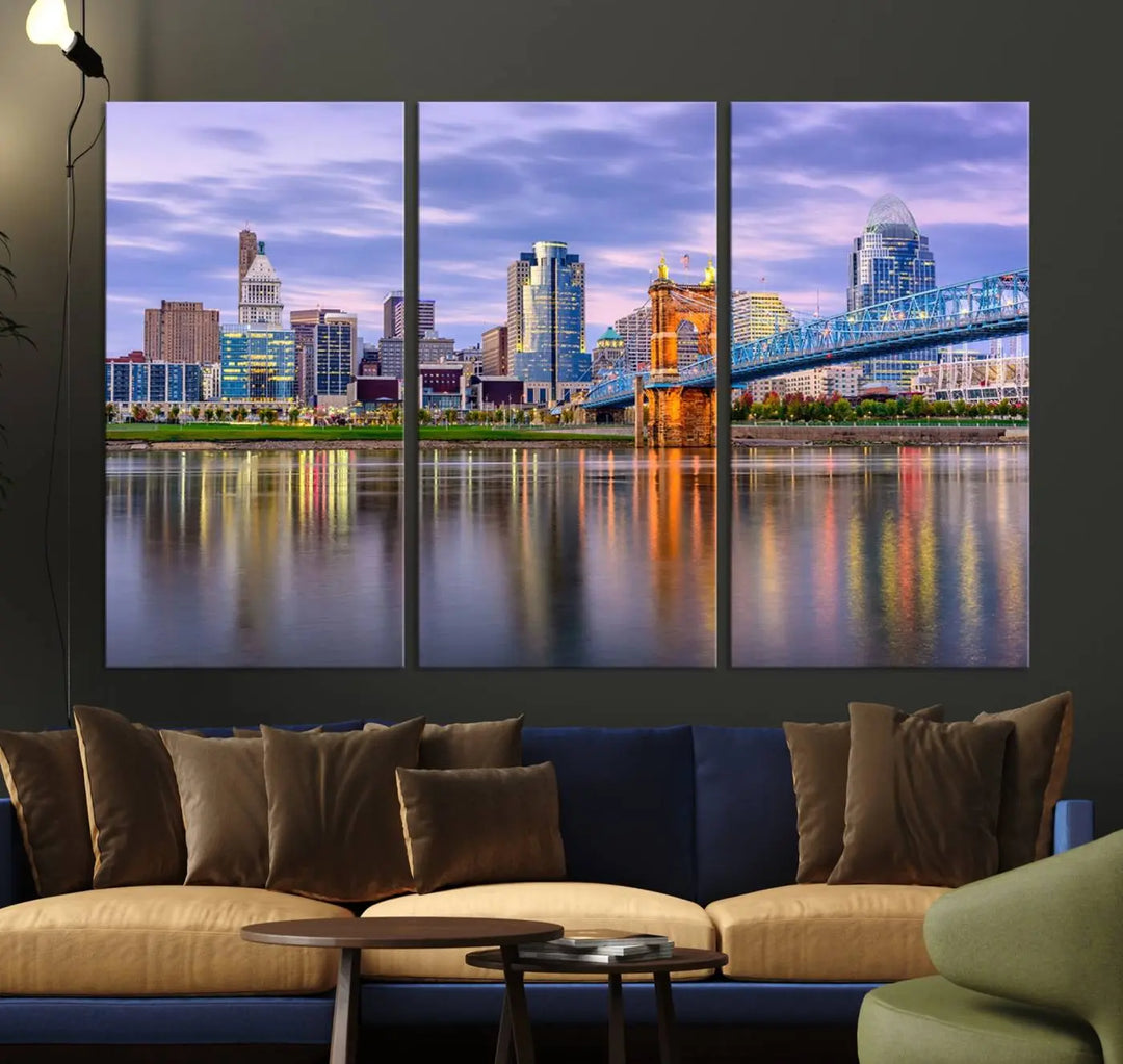 The room features the Cincinnati City Lights Sunset Purple Cloudy Skyline Cityscape View Wall Art Canvas Print, showcasing a breathtaking skyline reflecting on the river. Each piece is created with museum-quality canvas, includes UV-protective coating, and comes ready to hang.