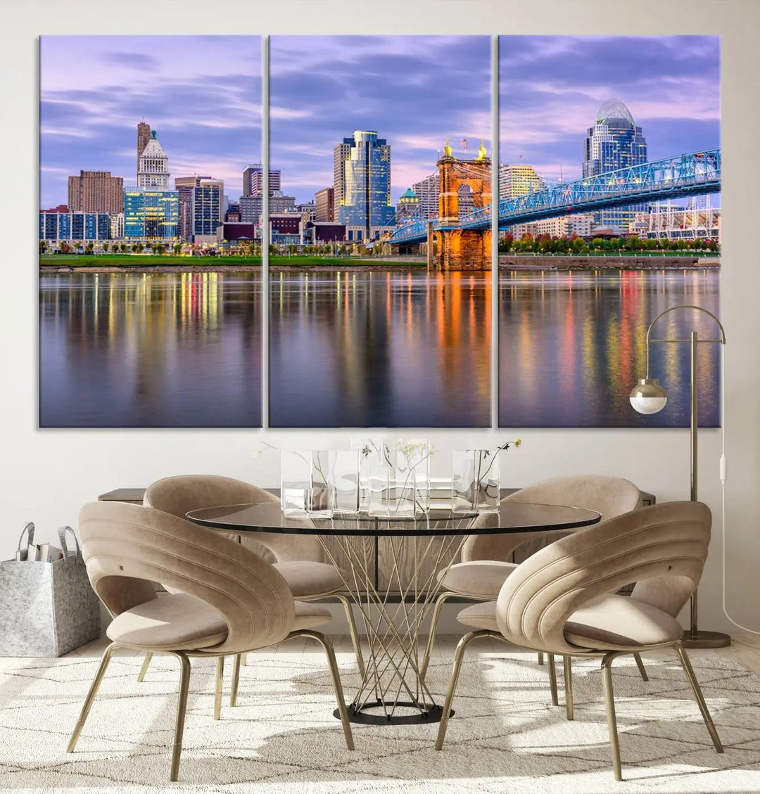 The room features the Cincinnati City Lights Sunset Purple Cloudy Skyline Cityscape View Wall Art Canvas Print, showcasing a breathtaking skyline reflecting on the river. Each piece is created with museum-quality canvas, includes UV-protective coating, and comes ready to hang.