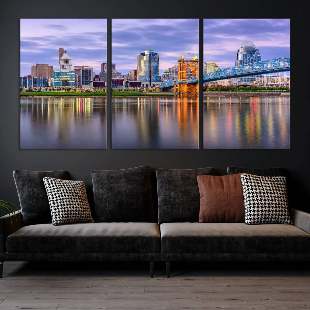 The room features the Cincinnati City Lights Sunset Purple Cloudy Skyline Cityscape View Wall Art Canvas Print, showcasing a breathtaking skyline reflecting on the river. Each piece is created with museum-quality canvas, includes UV-protective coating, and comes ready to hang.