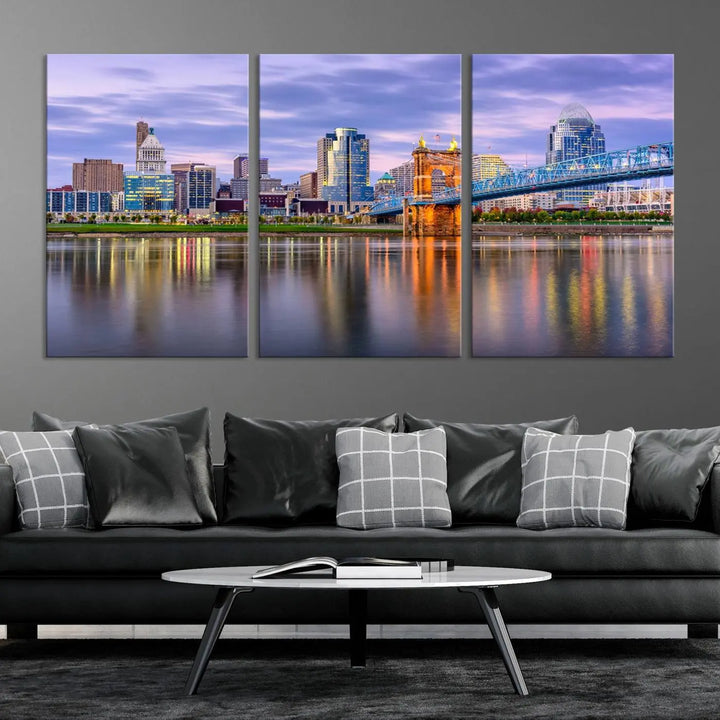 The room features the Cincinnati City Lights Sunset Purple Cloudy Skyline Cityscape View Wall Art Canvas Print, showcasing a breathtaking skyline reflecting on the river. Each piece is created with museum-quality canvas, includes UV-protective coating, and comes ready to hang.