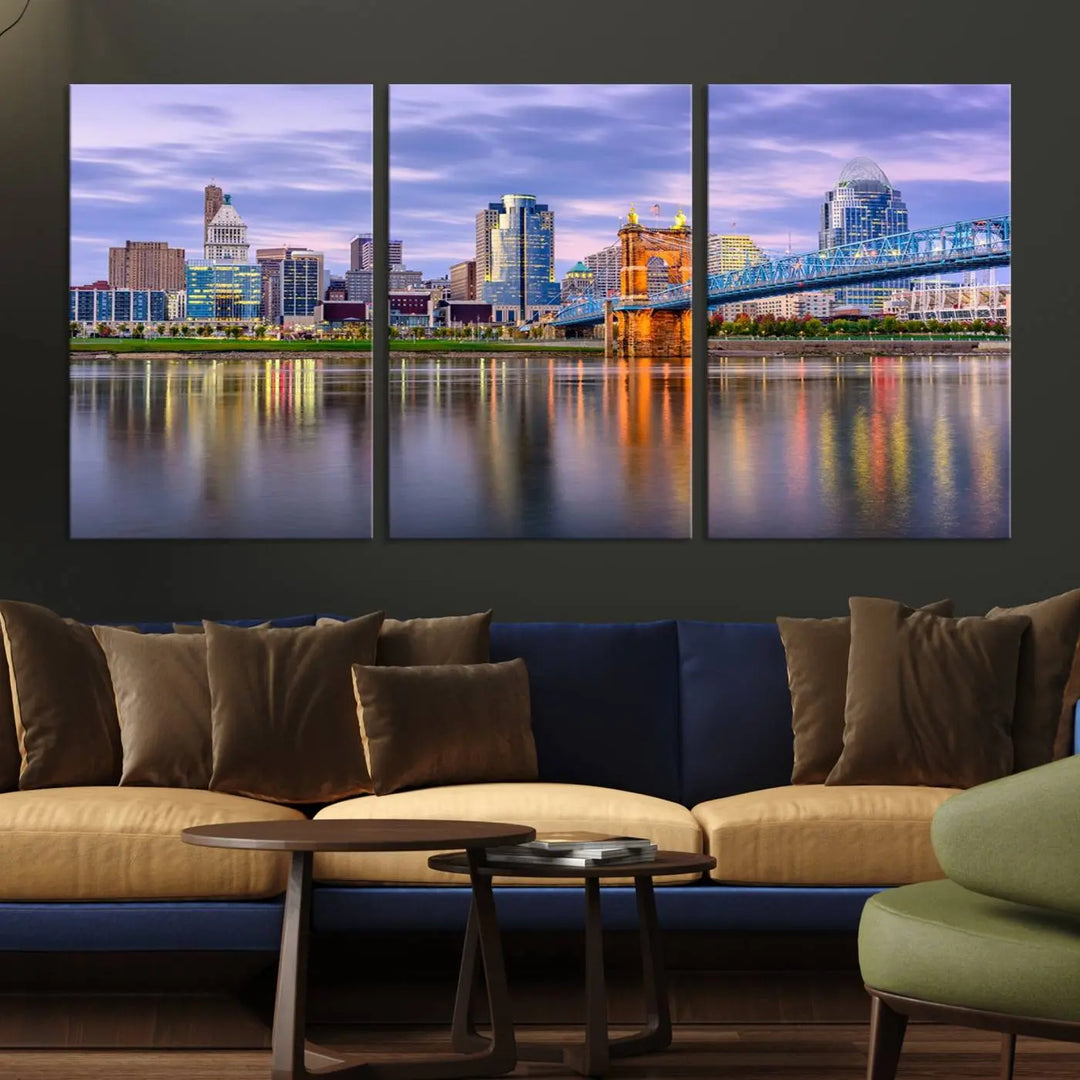 The room features the Cincinnati City Lights Sunset Purple Cloudy Skyline Cityscape View Wall Art Canvas Print, showcasing a breathtaking skyline reflecting on the river. Each piece is created with museum-quality canvas, includes UV-protective coating, and comes ready to hang.