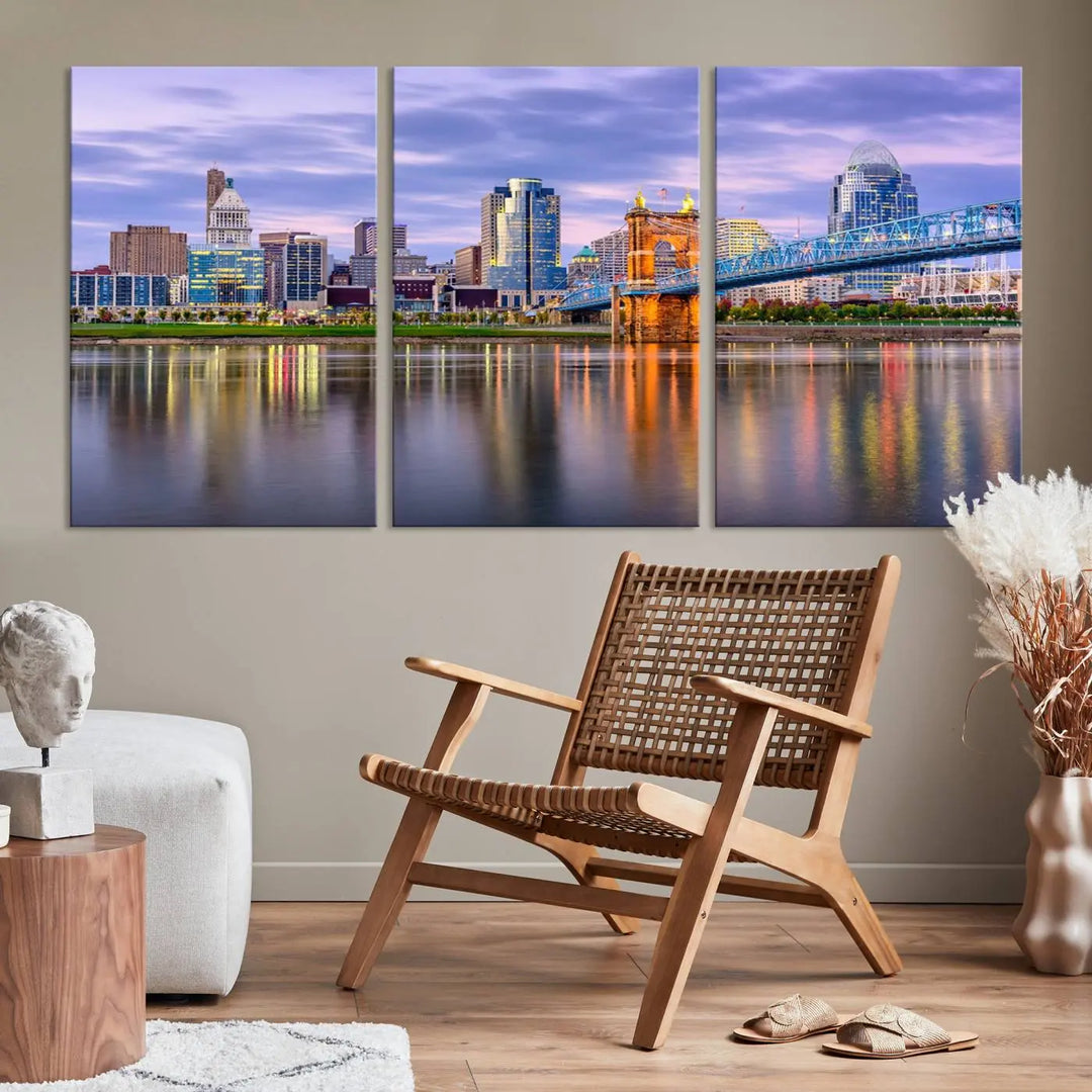 The room features the Cincinnati City Lights Sunset Purple Cloudy Skyline Cityscape View Wall Art Canvas Print, showcasing a breathtaking skyline reflecting on the river. Each piece is created with museum-quality canvas, includes UV-protective coating, and comes ready to hang.