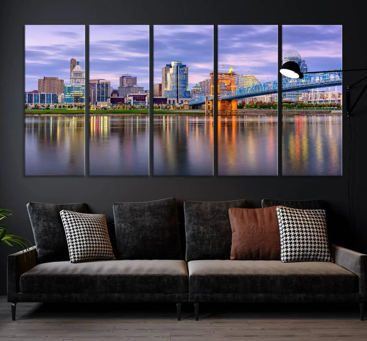 The room features the Cincinnati City Lights Sunset Purple Cloudy Skyline Cityscape View Wall Art Canvas Print, showcasing a breathtaking skyline reflecting on the river. Each piece is created with museum-quality canvas, includes UV-protective coating, and comes ready to hang.