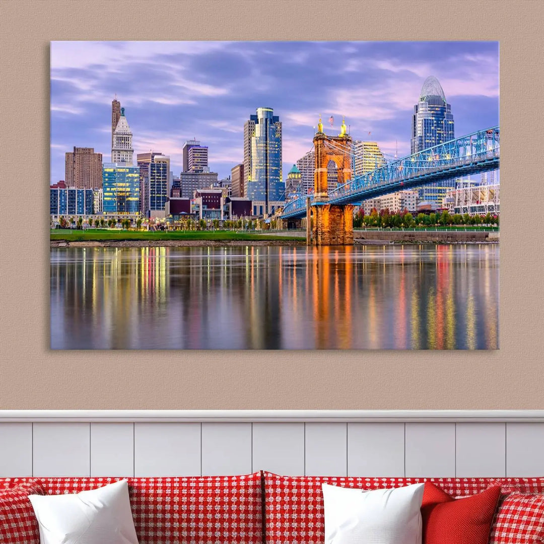 The wall art titled "Cincinnati City Lights Sunset Purple Cloudy Skyline Cityscape View" is beautifully printed on museum-quality canvases with a UV-protective coating and is ready to hang.