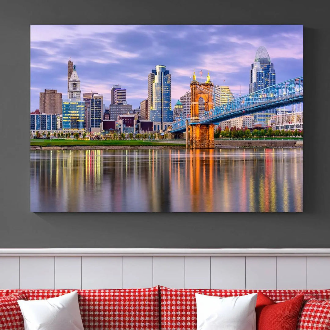 The wall art titled "Cincinnati City Lights Sunset Purple Cloudy Skyline Cityscape View" is beautifully printed on museum-quality canvases with a UV-protective coating and is ready to hang.