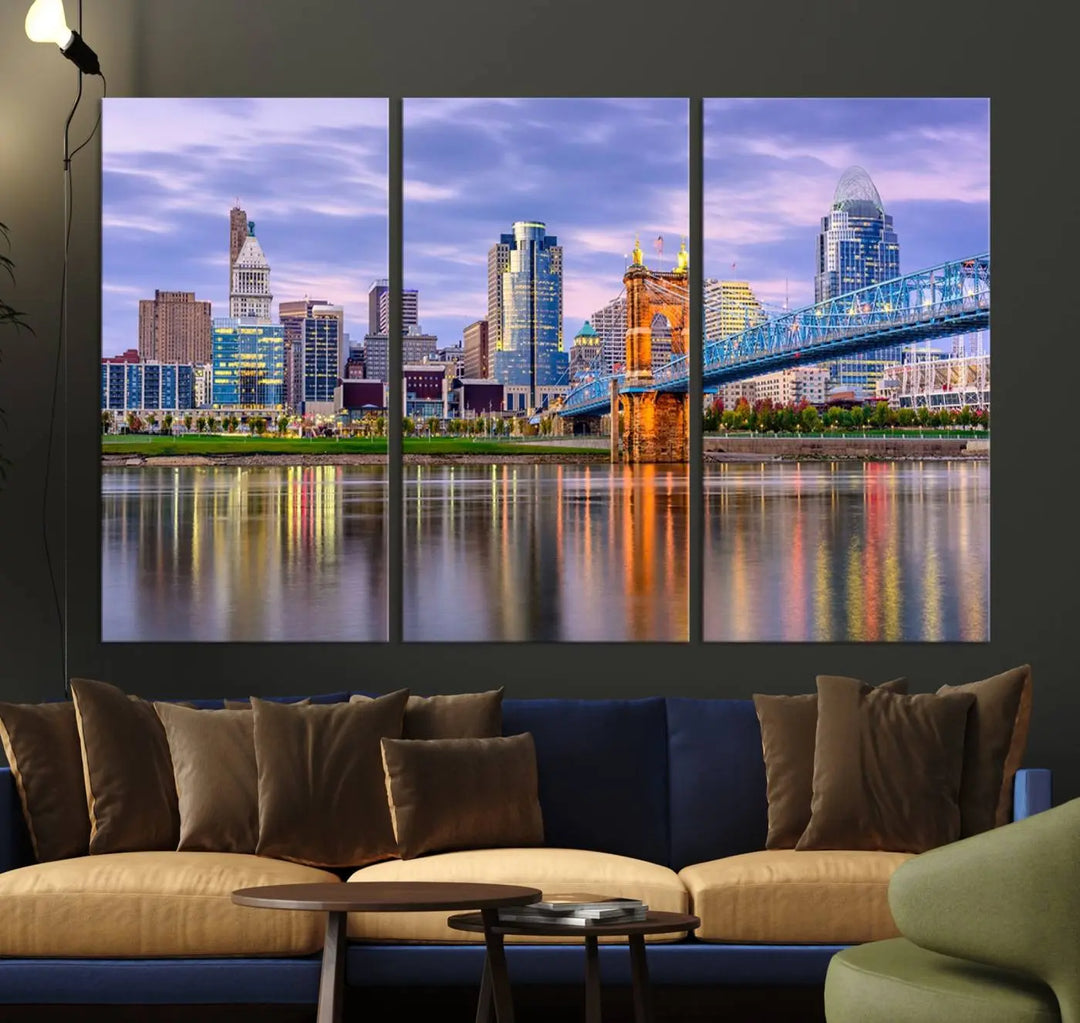 The wall art titled "Cincinnati City Lights Sunset Purple Cloudy Skyline Cityscape View" is beautifully printed on museum-quality canvases with a UV-protective coating and is ready to hang.