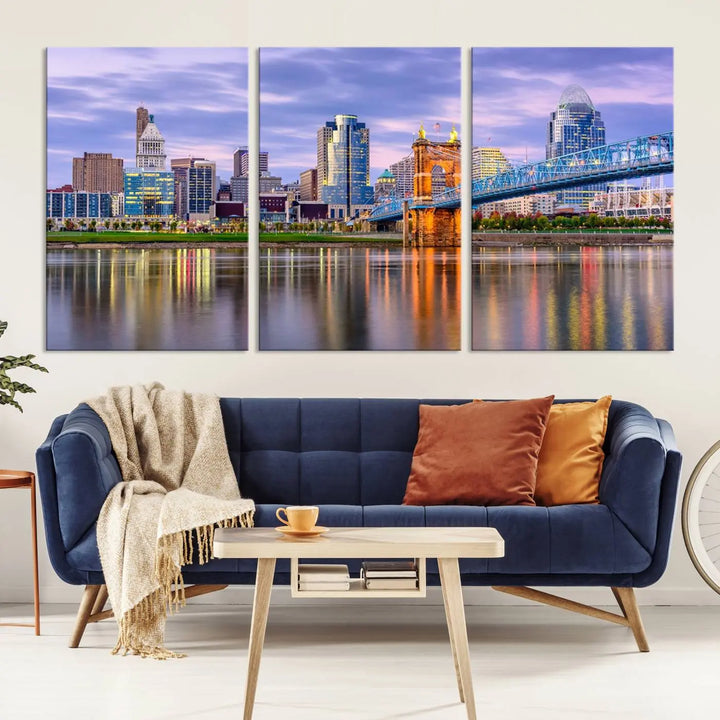 The wall art titled "Cincinnati City Lights Sunset Purple Cloudy Skyline Cityscape View" is beautifully printed on museum-quality canvases with a UV-protective coating and is ready to hang.