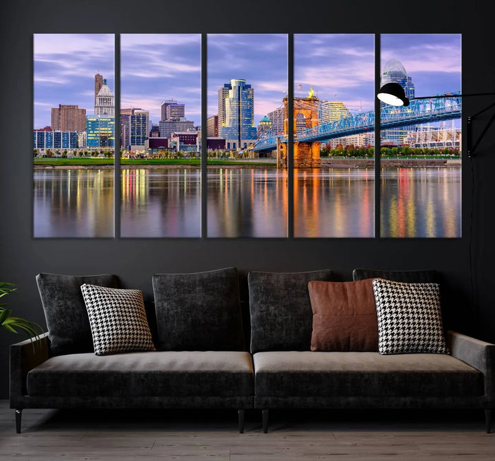 The wall art titled "Cincinnati City Lights Sunset Purple Cloudy Skyline Cityscape View" is beautifully printed on museum-quality canvases with a UV-protective coating and is ready to hang.