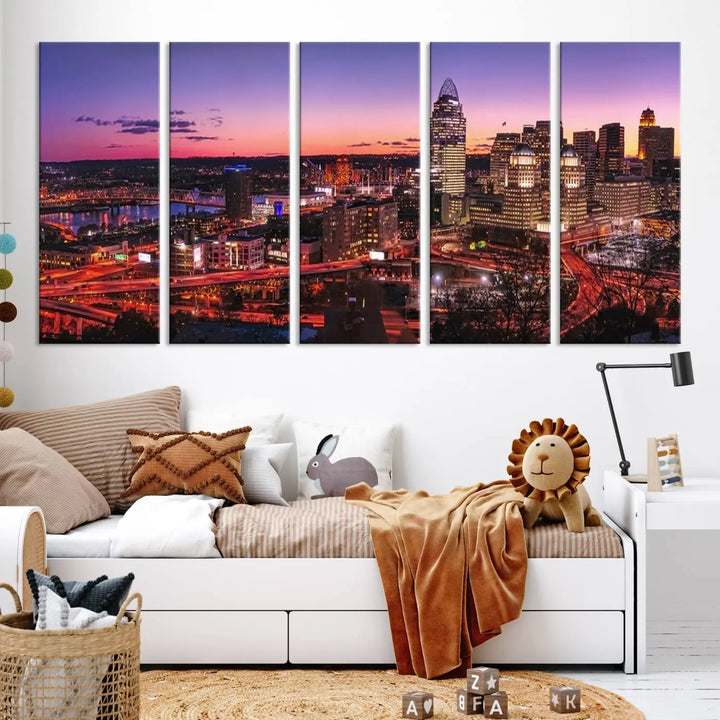 The Cincinnati City Sunset Purple Skyline Cityscape View Wall Art Canvas Print showcases a beautiful cityscape photo at sunset on a gallery-wrapped, museum-quality canvas. It is enhanced with a UV-protective coating to ensure lasting vibrancy and longevity.