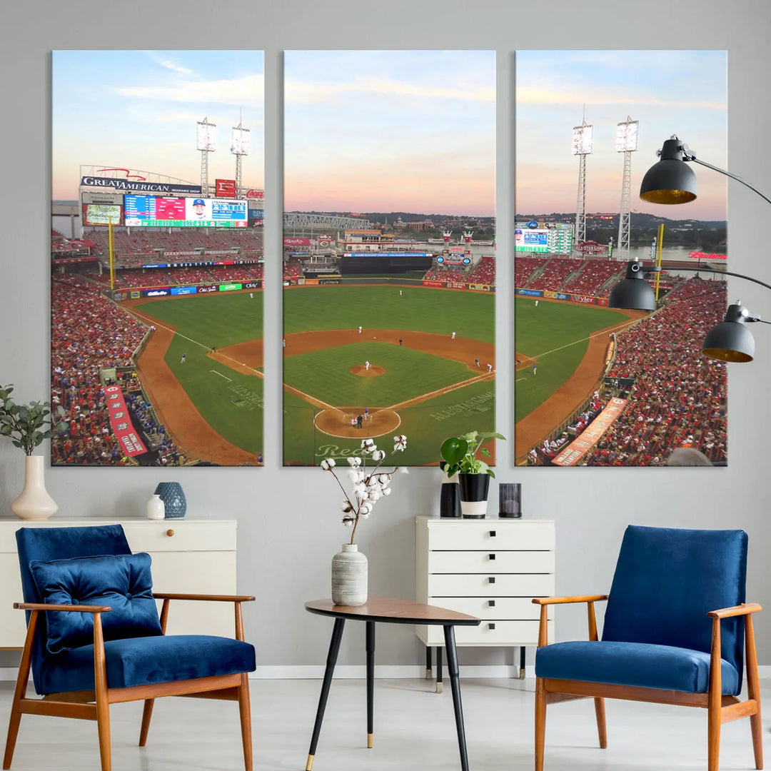 A canvas print of the Cincinnati Reds Baseball Team features a stunning image of the Great American Ball Park at sunset.