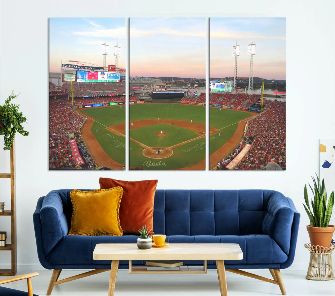 A canvas print of the Cincinnati Reds Baseball Team features a stunning image of the Great American Ball Park at sunset.