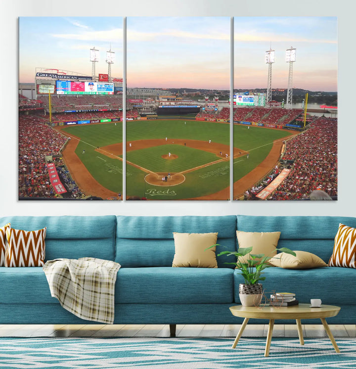 A canvas print of the Cincinnati Reds Baseball Team features a stunning image of the Great American Ball Park at sunset.