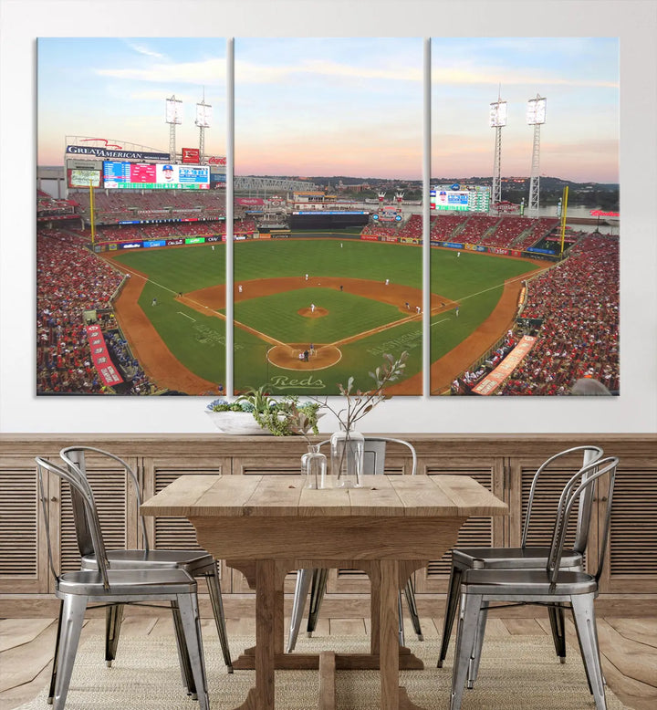 A canvas print of the Cincinnati Reds Baseball Team features a stunning image of the Great American Ball Park at sunset.