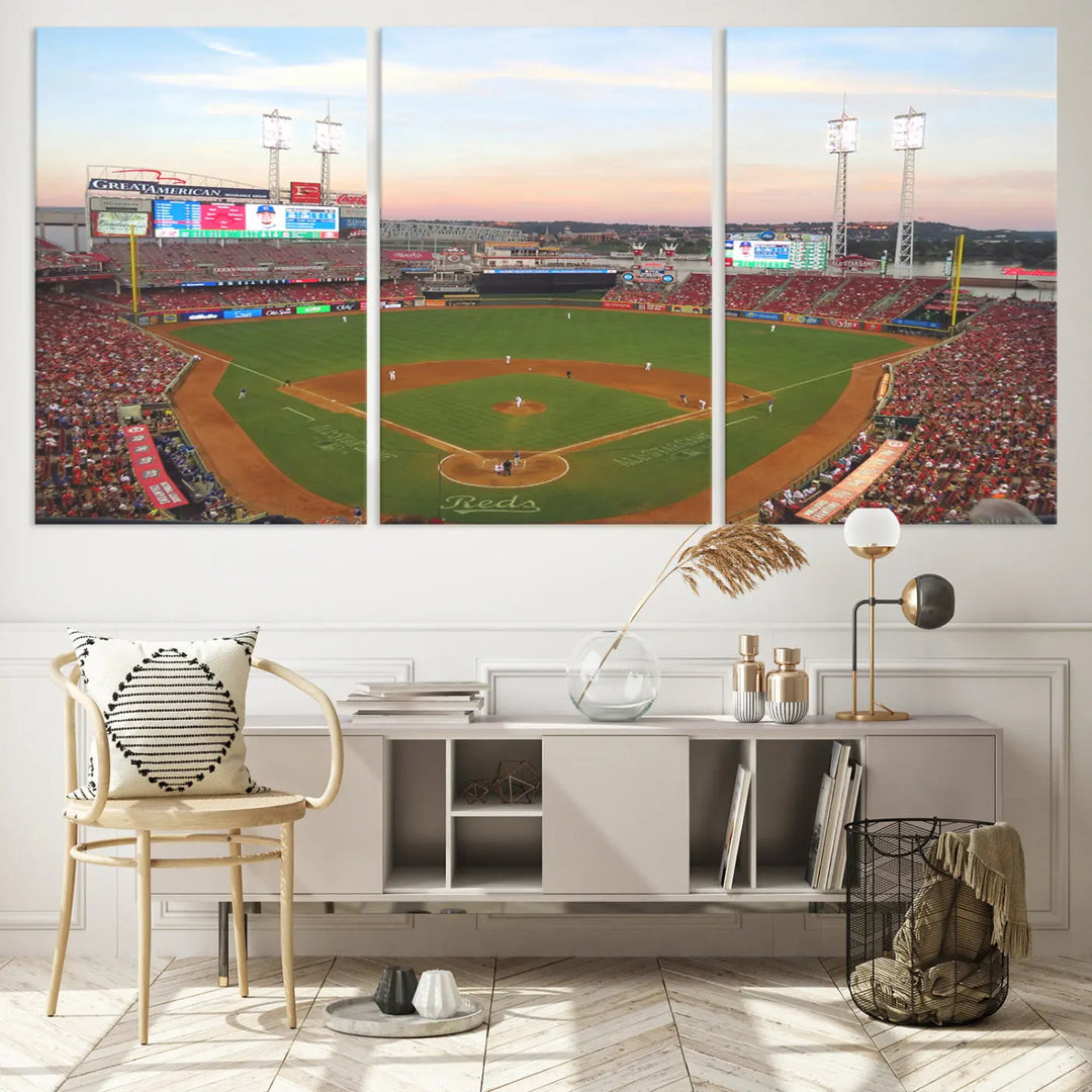 A canvas print of the Cincinnati Reds Baseball Team features a stunning image of the Great American Ball Park at sunset.