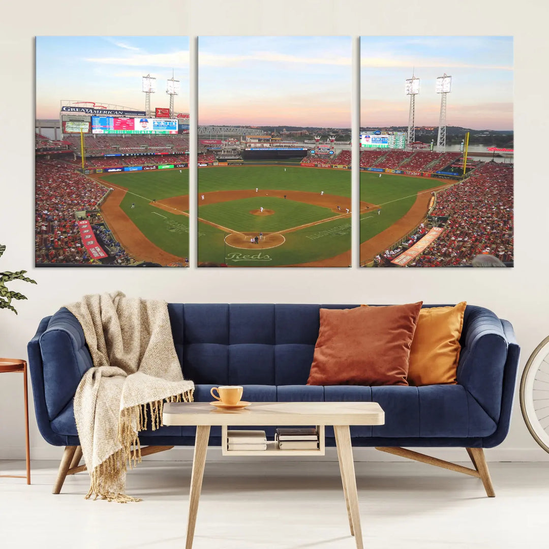 A canvas print of the Cincinnati Reds Baseball Team features a stunning image of the Great American Ball Park at sunset.