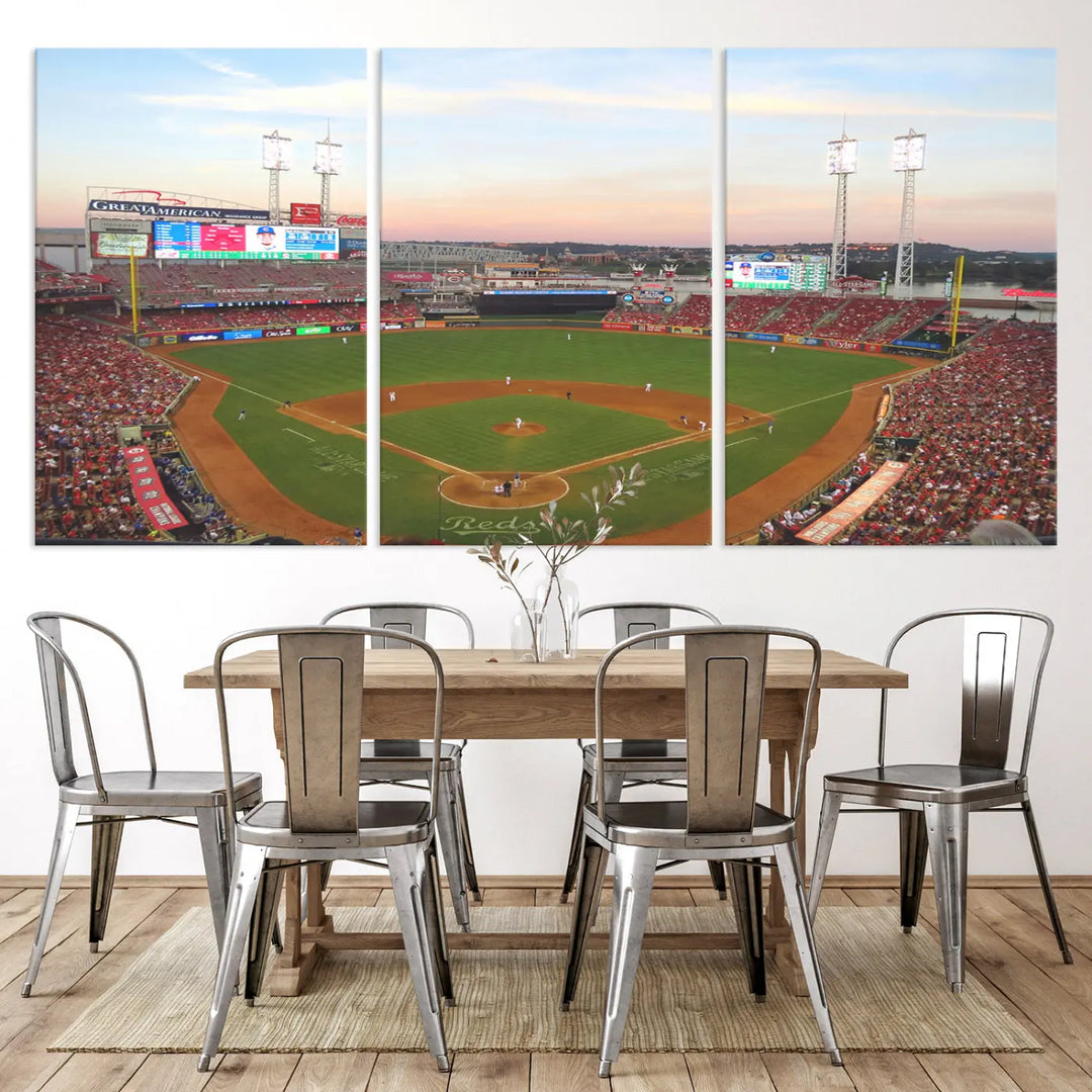 A canvas print of the Cincinnati Reds Baseball Team features a stunning image of the Great American Ball Park at sunset.