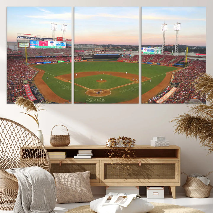 A canvas print of the Cincinnati Reds Baseball Team features a stunning image of the Great American Ball Park at sunset.