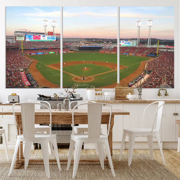 A canvas print of the Cincinnati Reds Baseball Team features a stunning image of the Great American Ball Park at sunset.