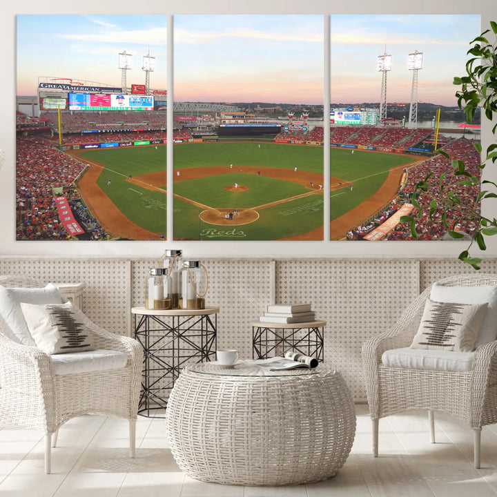 A canvas print of the Cincinnati Reds Baseball Team features a stunning image of the Great American Ball Park at sunset.