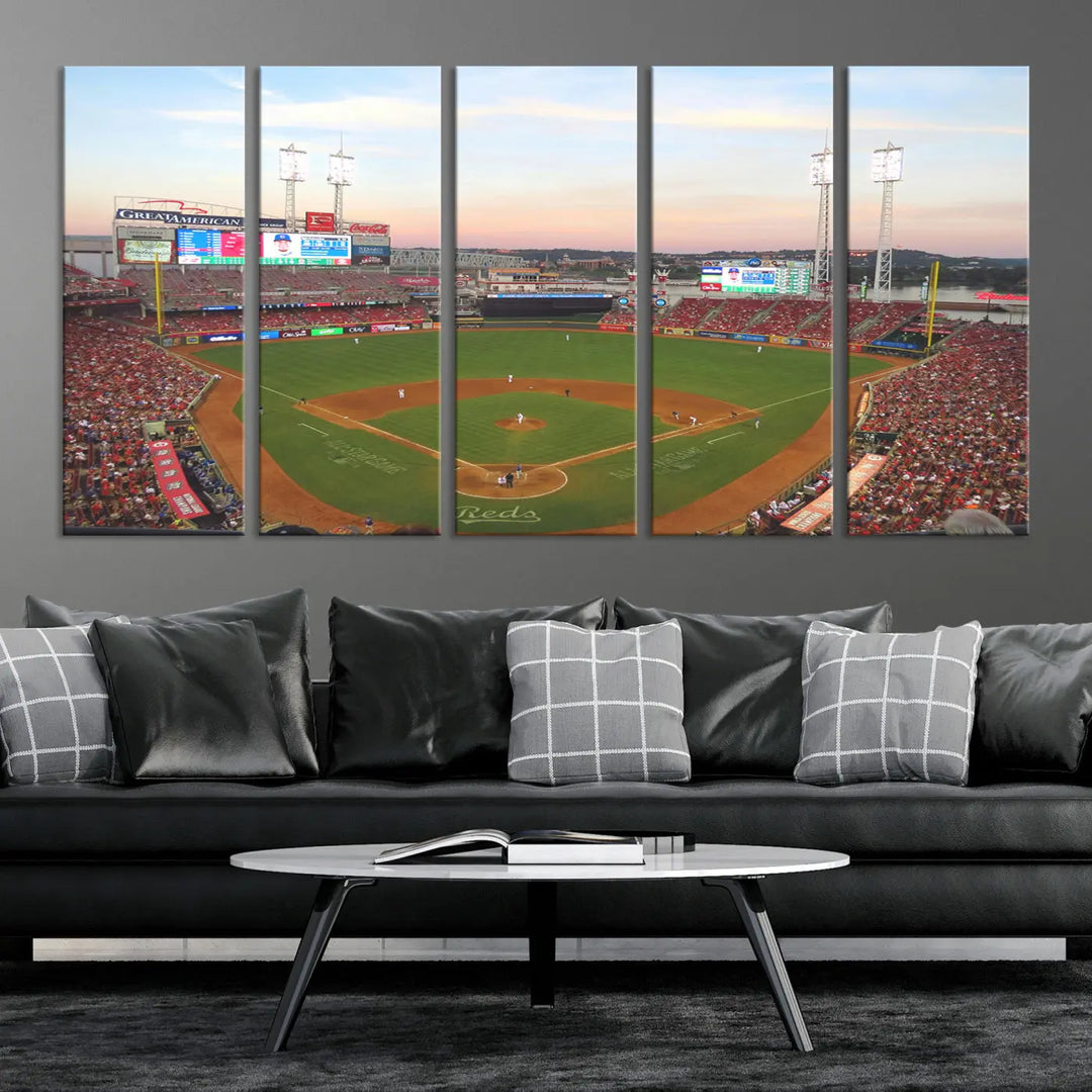 A canvas print of the Cincinnati Reds Baseball Team features a stunning image of the Great American Ball Park at sunset.