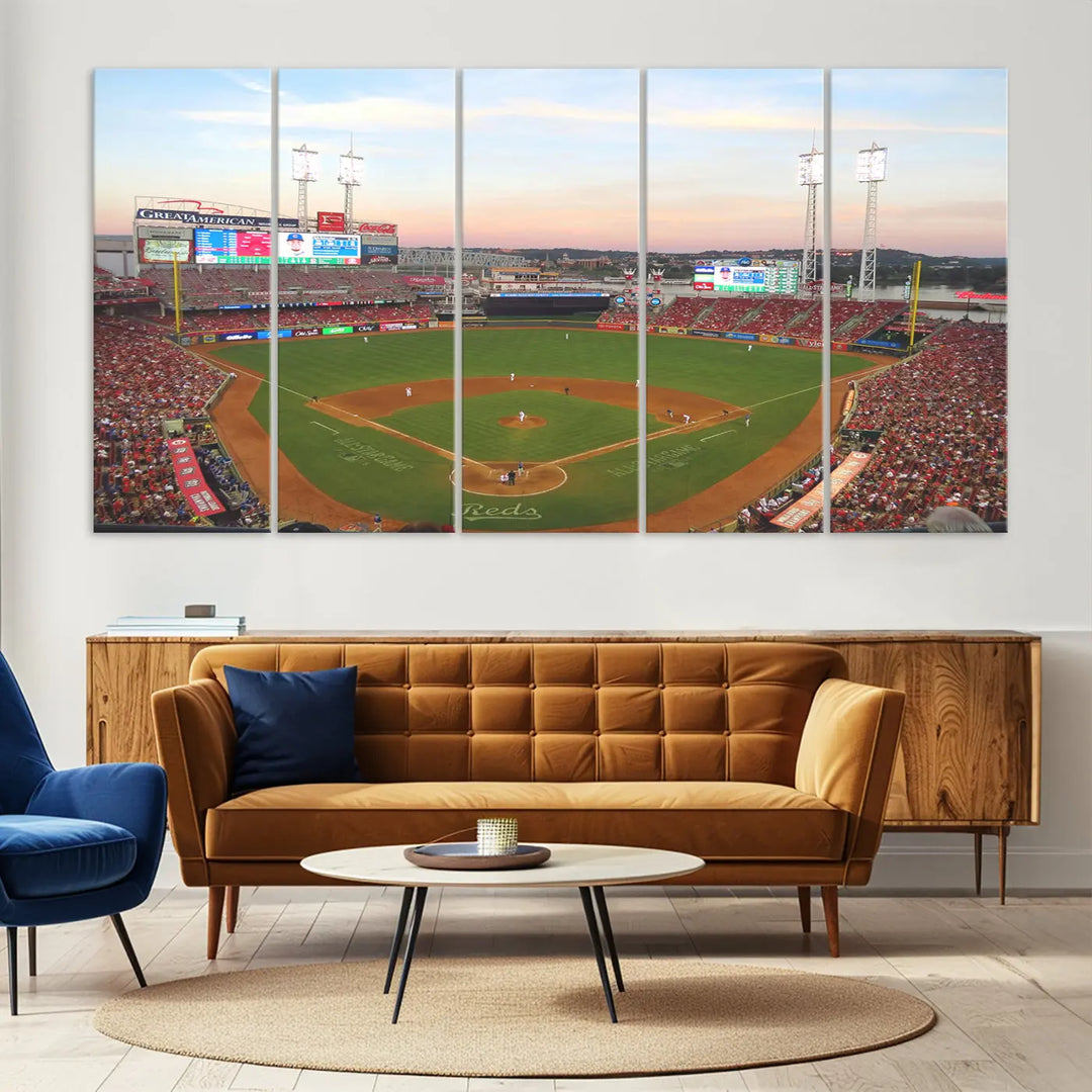 A canvas print of the Cincinnati Reds Baseball Team features a stunning image of the Great American Ball Park at sunset.