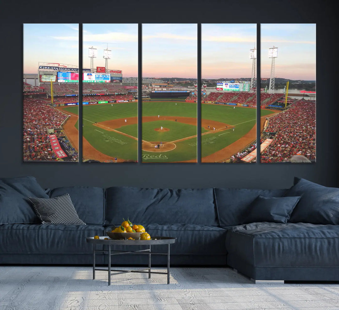 A canvas print of the Cincinnati Reds Baseball Team features a stunning image of the Great American Ball Park at sunset.