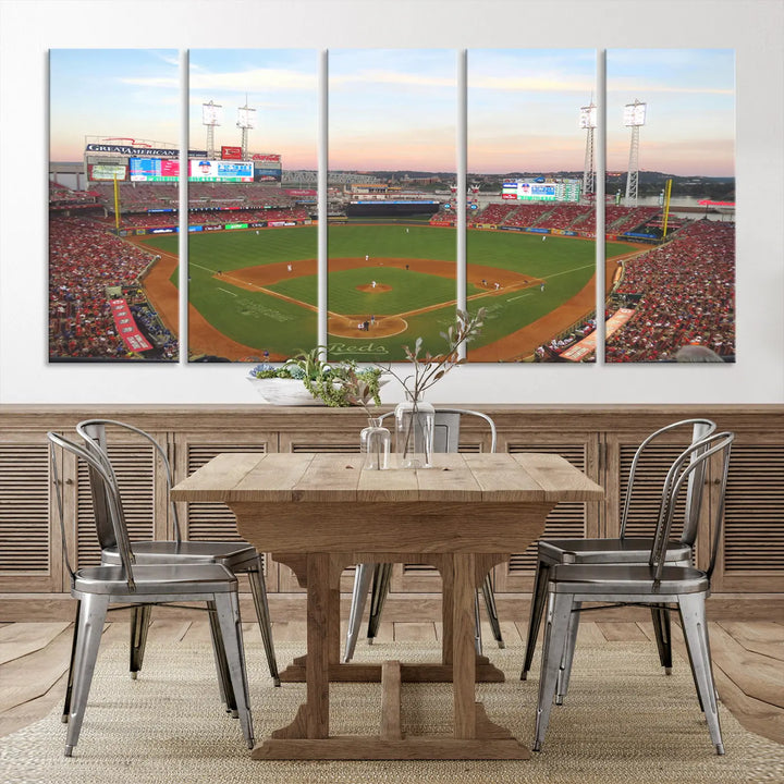 A canvas print of the Cincinnati Reds Baseball Team features a stunning image of the Great American Ball Park at sunset.