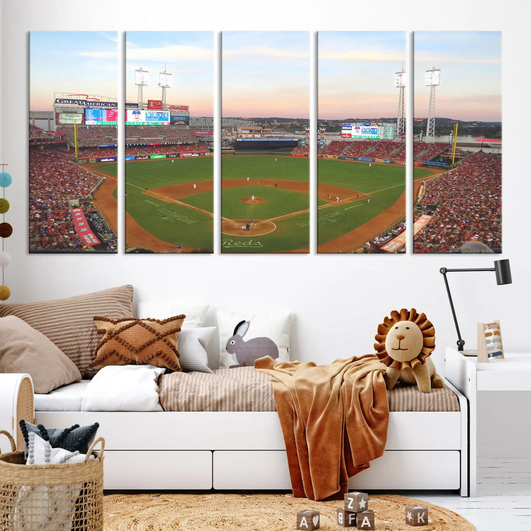 A canvas print of the Cincinnati Reds Baseball Team features a stunning image of the Great American Ball Park at sunset.