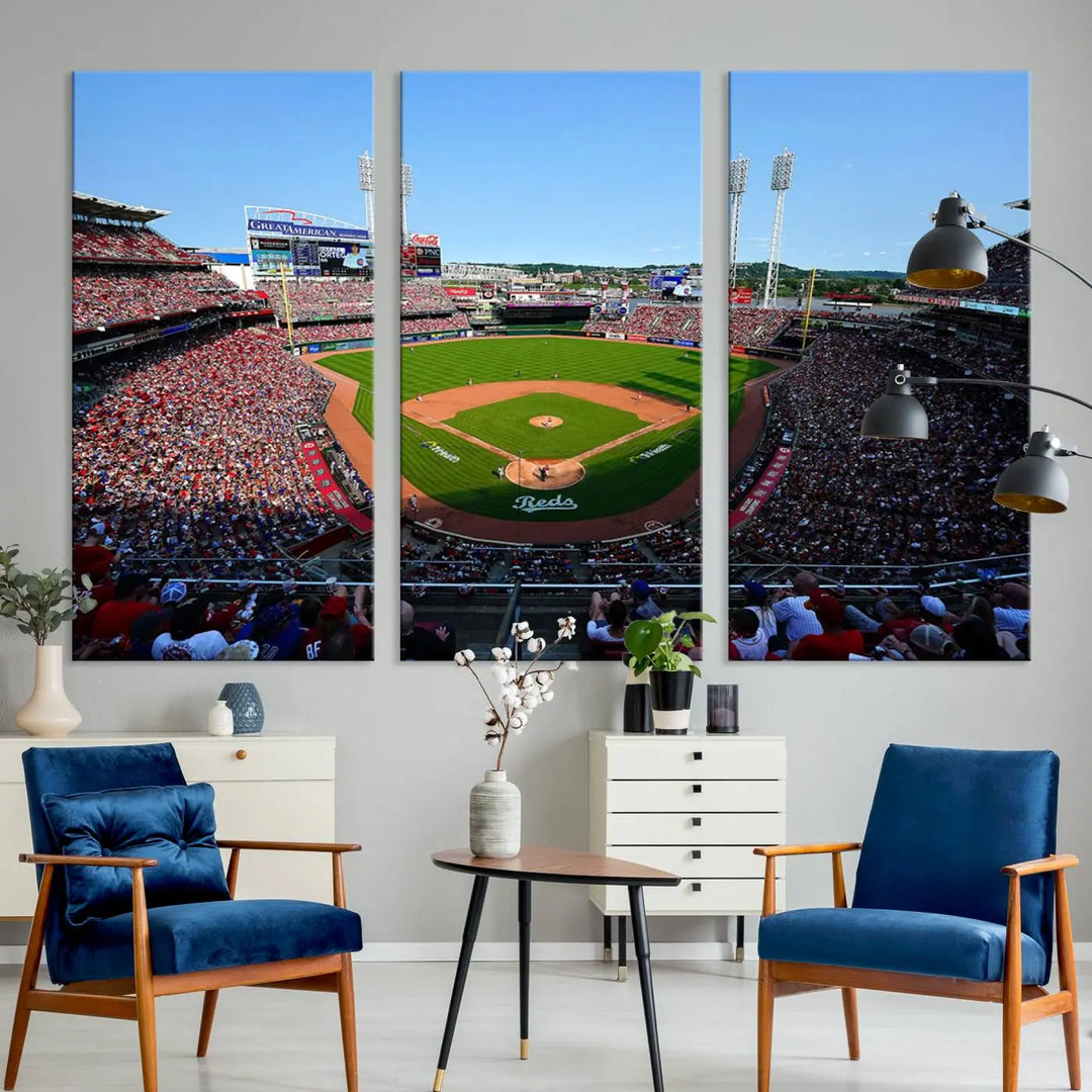 Wall art showcasing the Cincinnati Reds Baseball Team Print features a panoramic view of a bustling Great American Ball Park Stadium on a gallery-quality canvas.