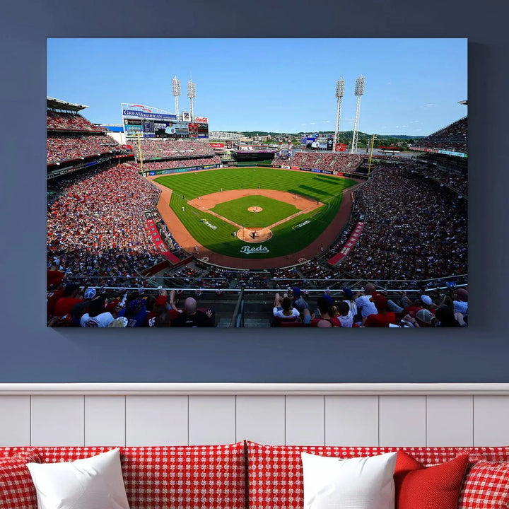 Wall art showcasing the Cincinnati Reds Baseball Team Print features a panoramic view of a bustling Great American Ball Park Stadium on a gallery-quality canvas.