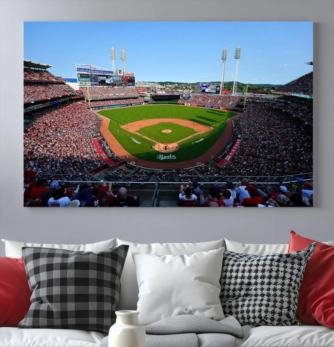 Wall art showcasing the Cincinnati Reds Baseball Team Print features a panoramic view of a bustling Great American Ball Park Stadium on a gallery-quality canvas.