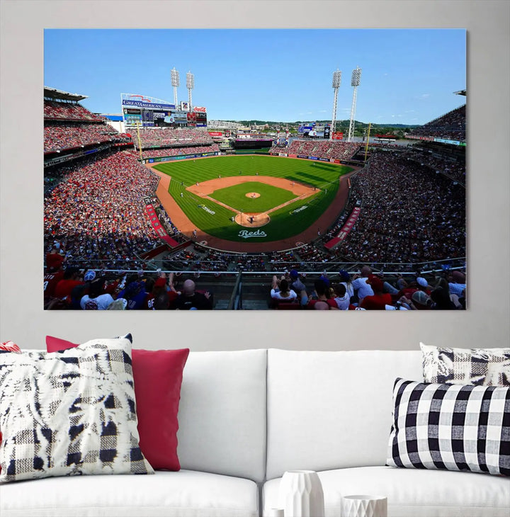 Wall art showcasing the Cincinnati Reds Baseball Team Print features a panoramic view of a bustling Great American Ball Park Stadium on a gallery-quality canvas.