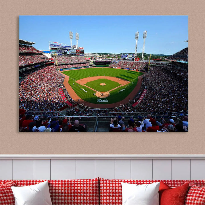 Wall art showcasing the Cincinnati Reds Baseball Team Print features a panoramic view of a bustling Great American Ball Park Stadium on a gallery-quality canvas.